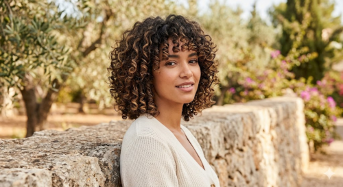 Curly Layered Bob with Bangs