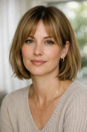 4. Chin-Length Bob With Curtain Bangs